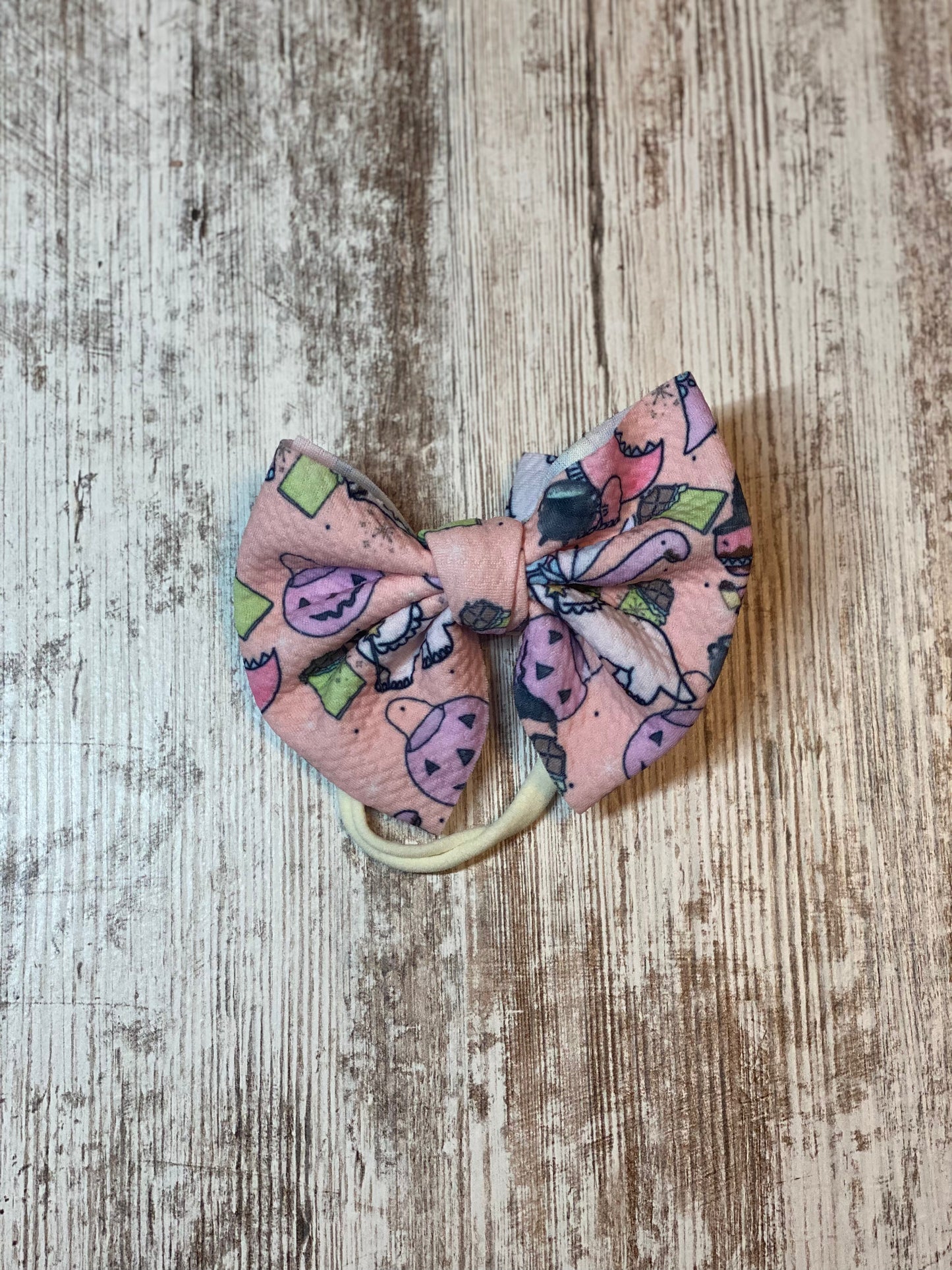 Chocolate Dino Baby Bow